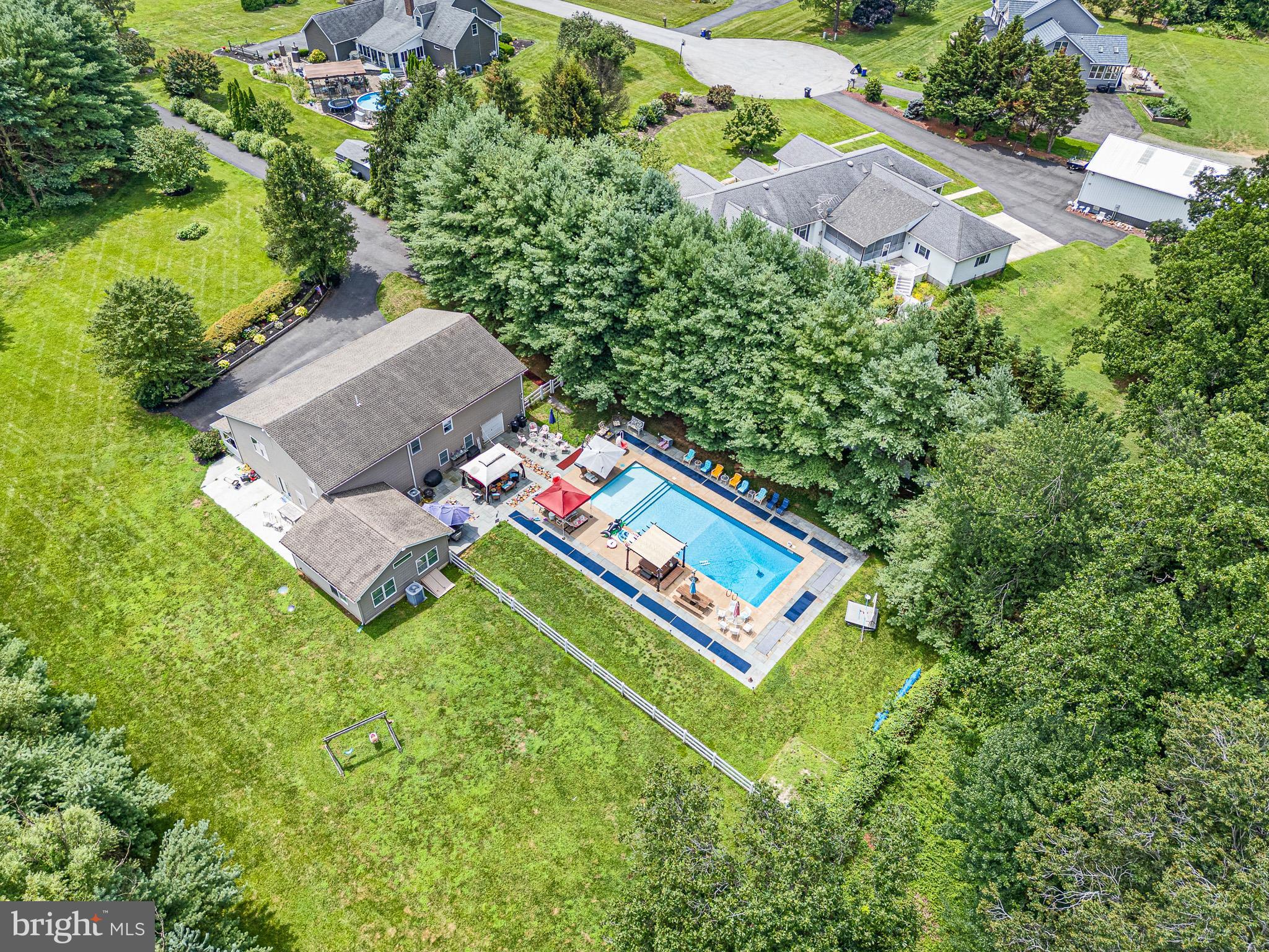 1381 Pole Bridge Road Middletown, DE 19709 - Photo 3 of 44 an aerial view of a house with pool yard and outdoor seating