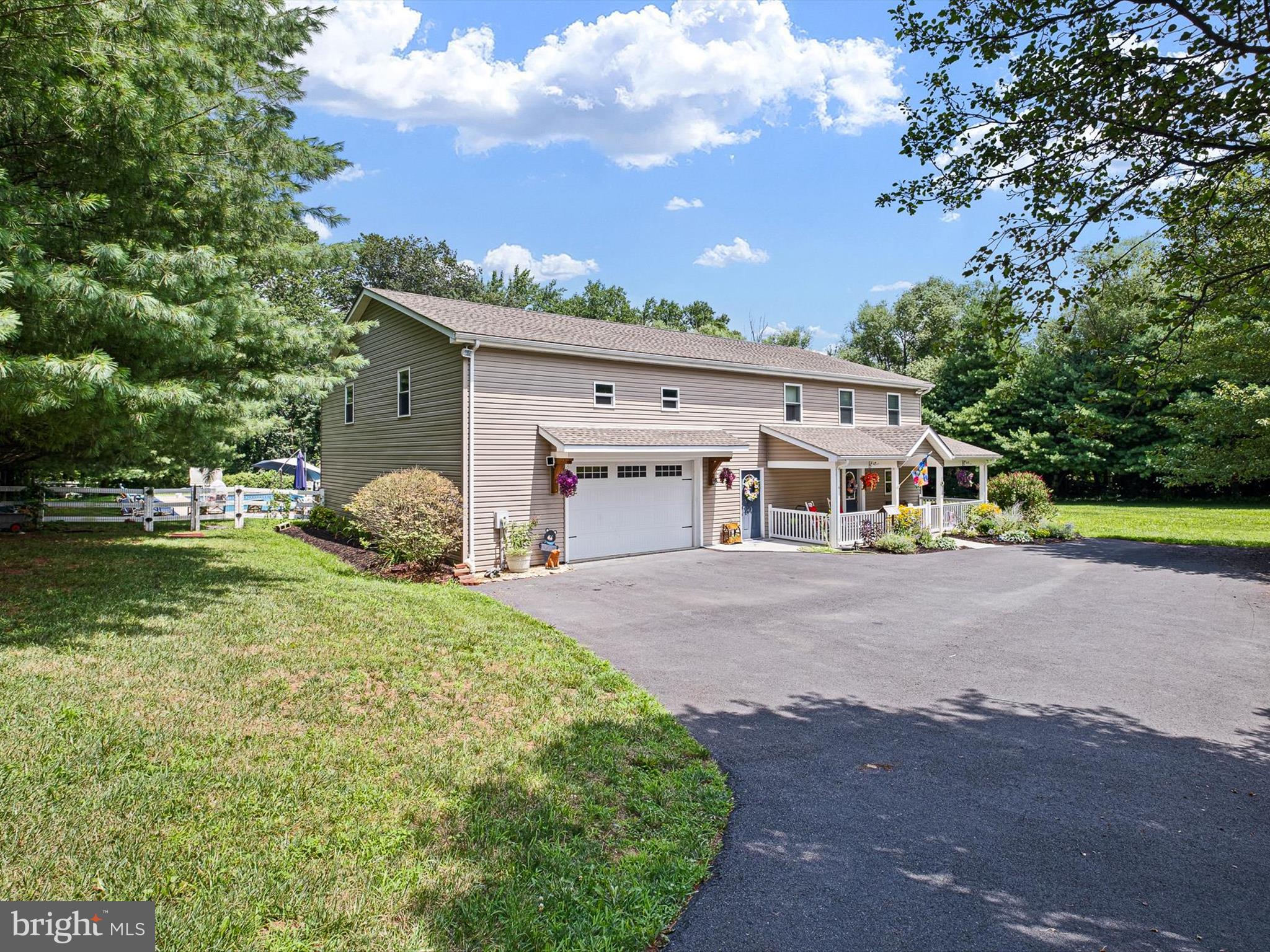 1381 Pole Bridge Road Middletown, DE 19709 - Photo 6 of 44 a front view of a house with garden