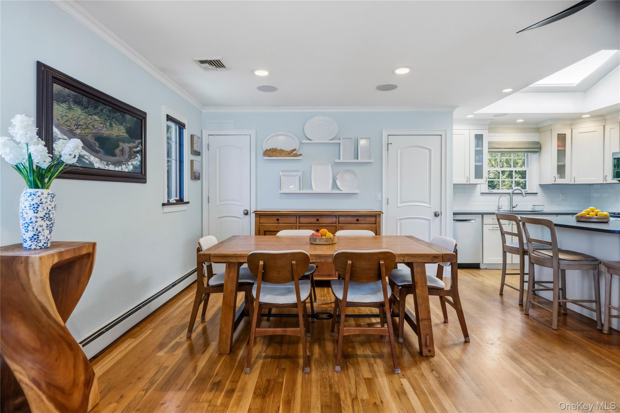 190 Sexton Road West Babylon, NY 11704 - Photo 11 of 28 a dining room with furniture and wooden floor