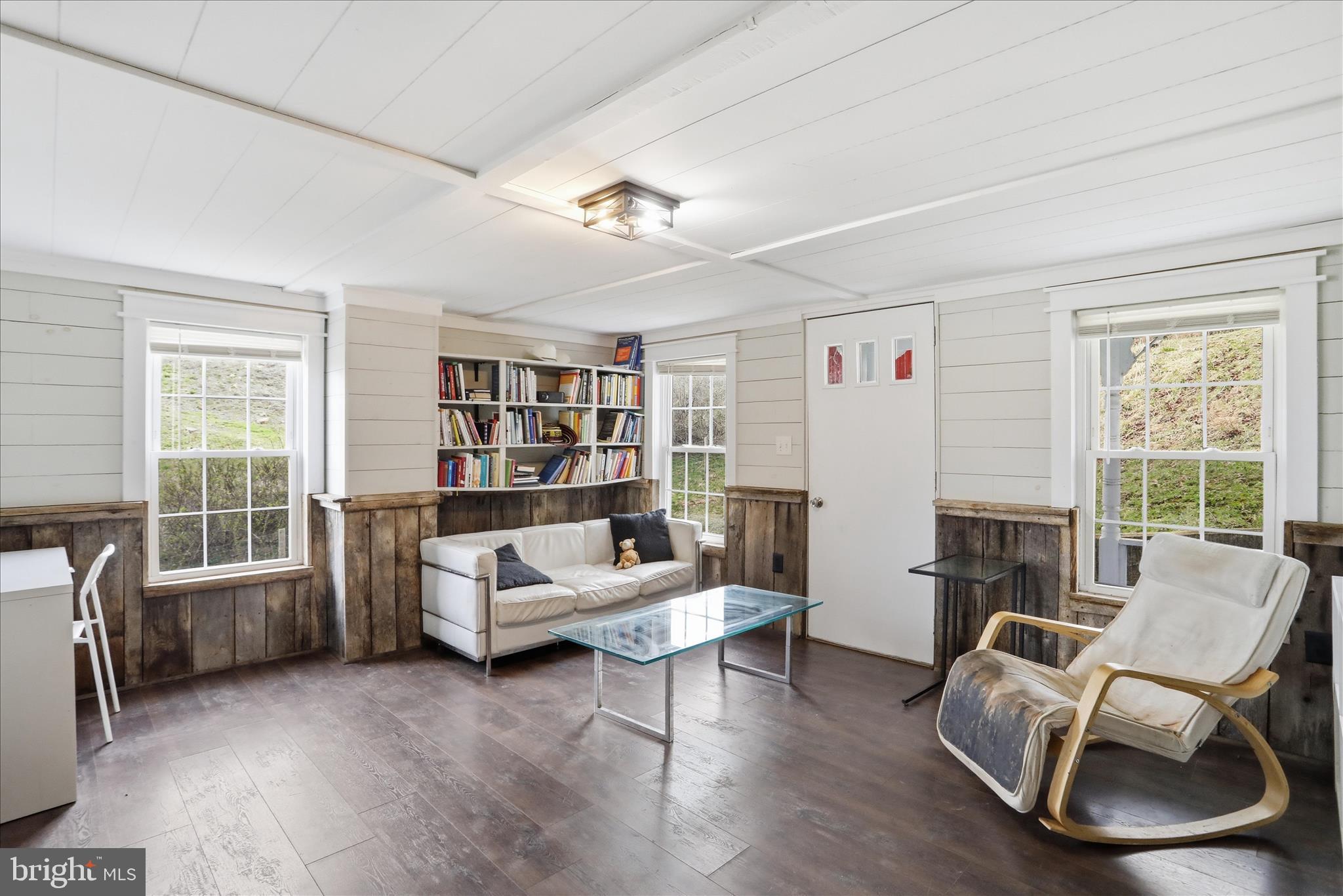 277 Bowmans Ridge Lane Burlington, WV 26710 - Photo 13 of 42 a living room with furniture and a fireplace