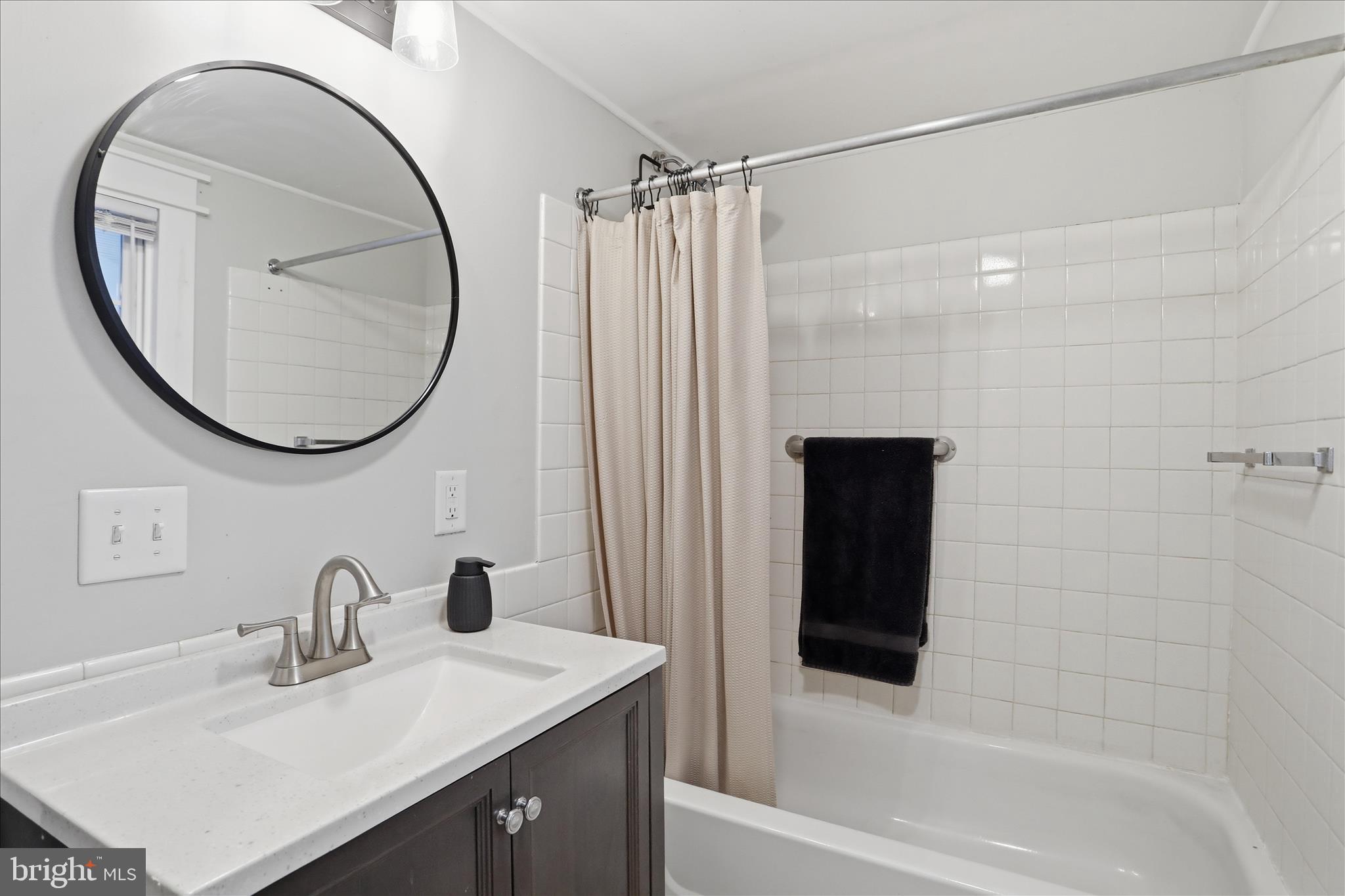 277 Bowmans Ridge Lane Burlington, WV 26710 - Photo 16 of 42 a bathroom with a sink vanity toilet and a mirror