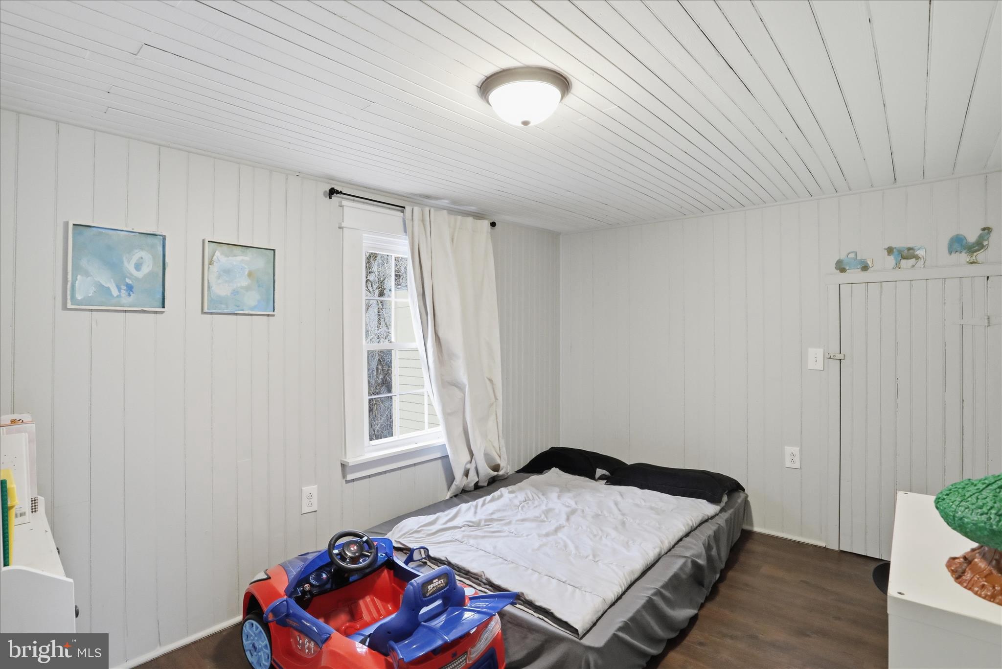 277 Bowmans Ridge Lane Burlington, WV 26710 - Photo 27 of 42 a bedroom with a bed and a window
