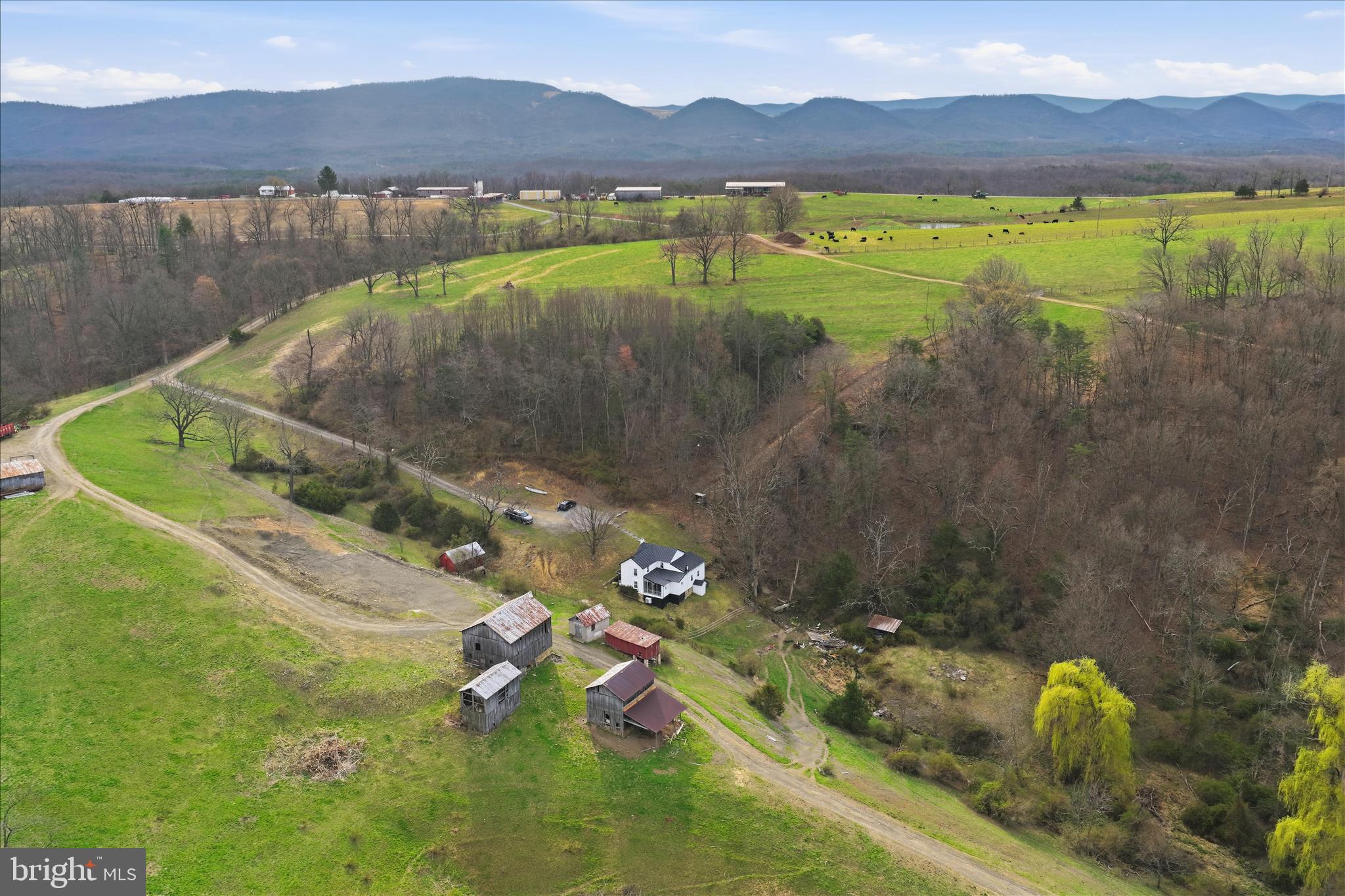 277 Bowmans Ridge Lane Burlington, WV 26710 - Photo 33 of 42 a aerial view of a house with a yard