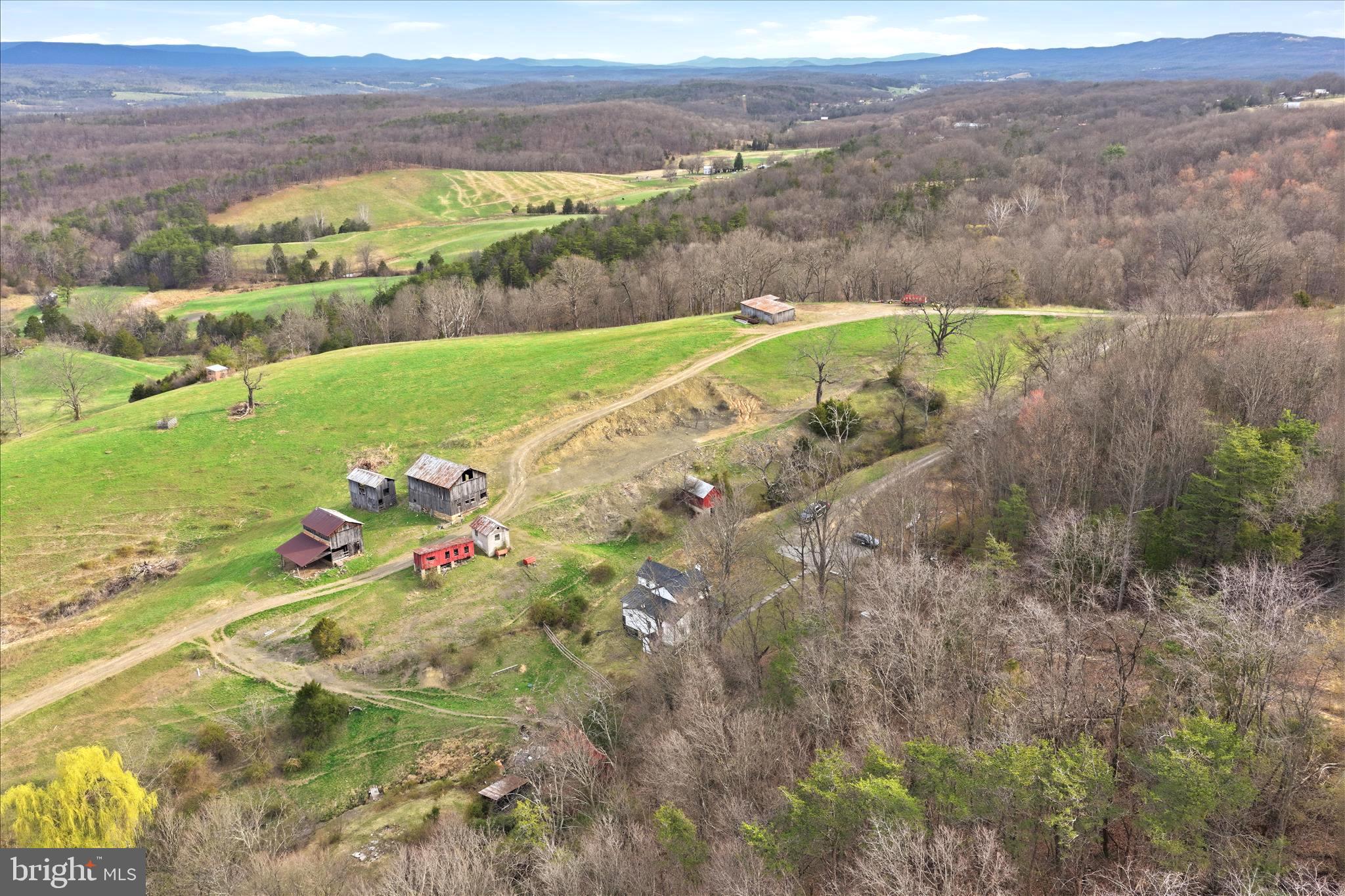 277 Bowmans Ridge Lane Burlington, WV 26710 - Photo 35 of 42 an aerial view of a house with a yard