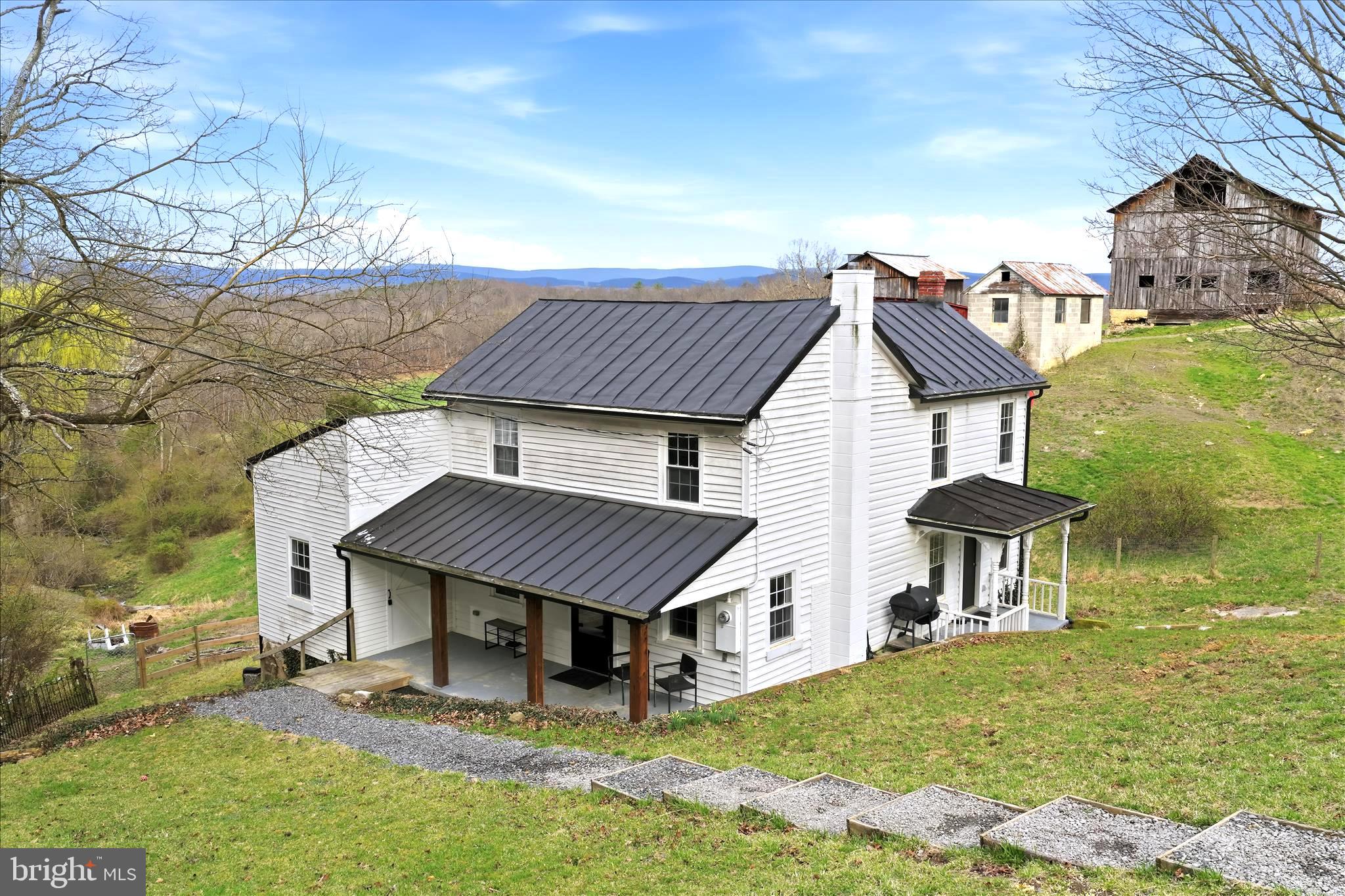 277 Bowmans Ridge Lane Burlington, WV 26710 - Photo 37 of 42 a aerial view of a house