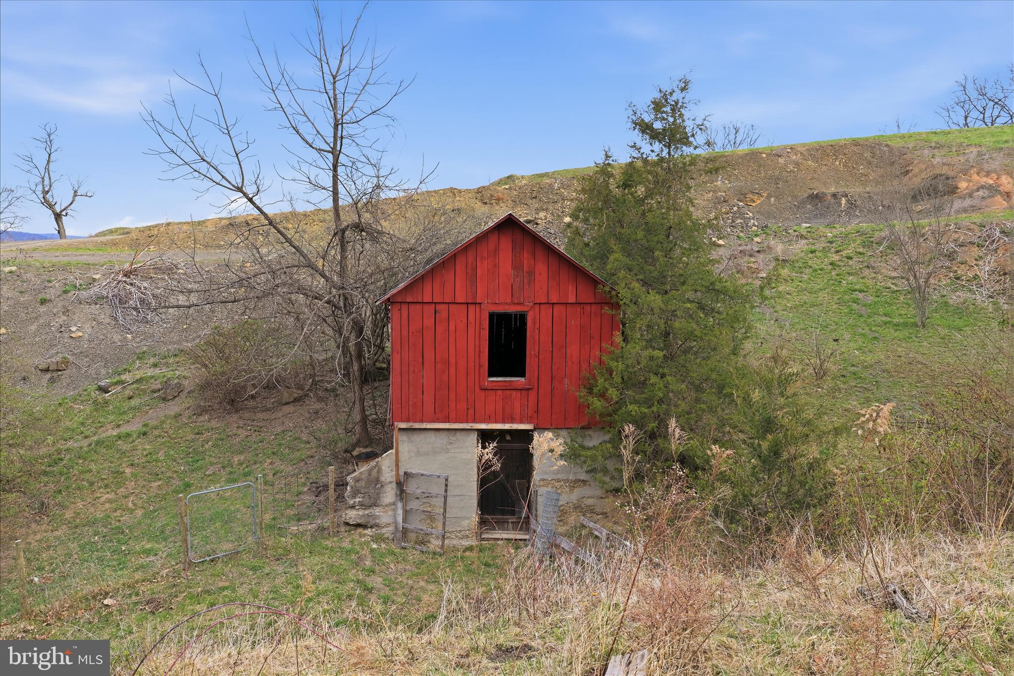 277 Bowmans Ridge Lane Burlington, WV 26710 - Photo 38 of 42 a front view of a house with a yard