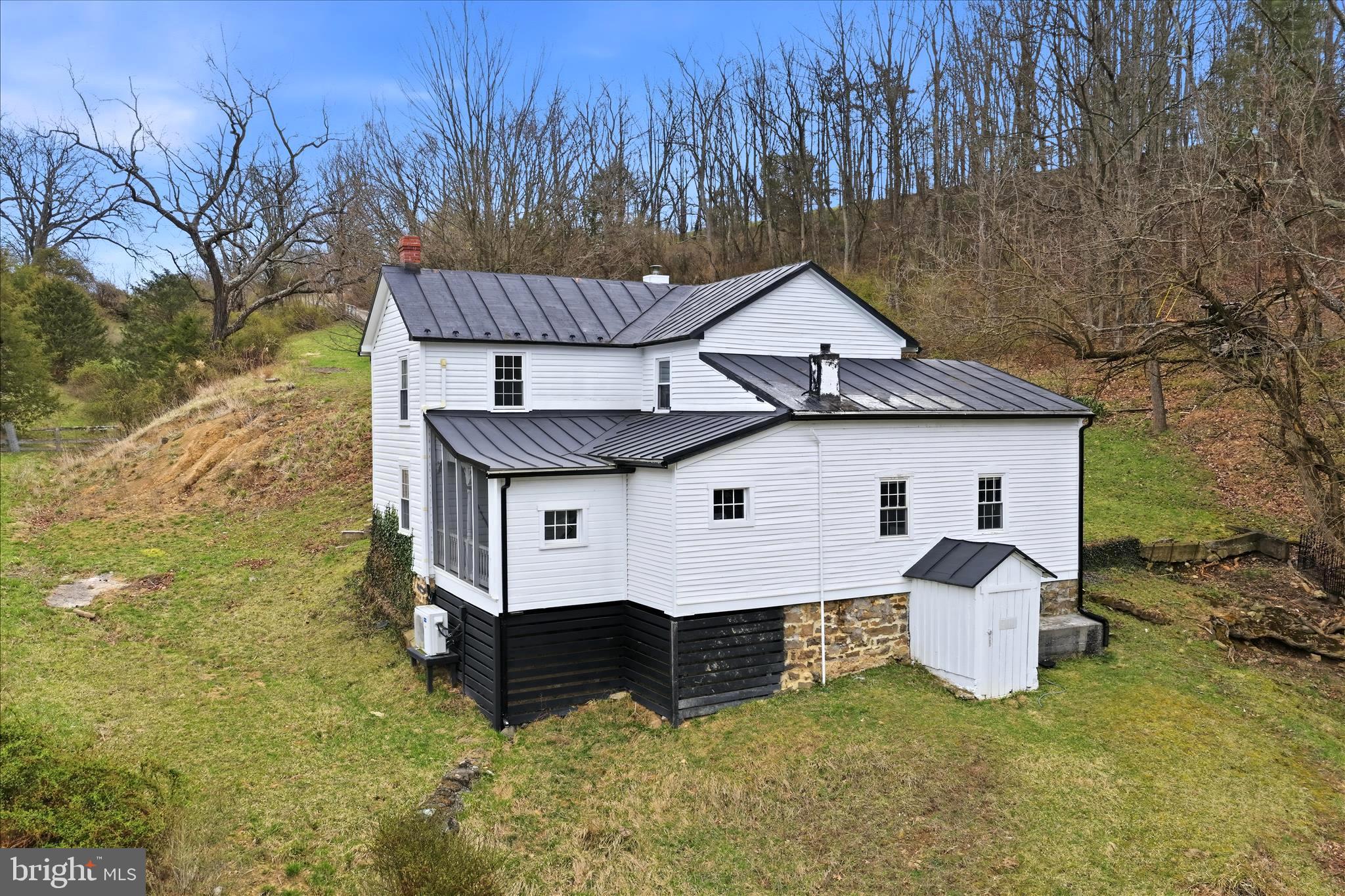 277 Bowmans Ridge Lane Burlington, WV 26710 - Photo 39 of 42 a view of a house with a yard