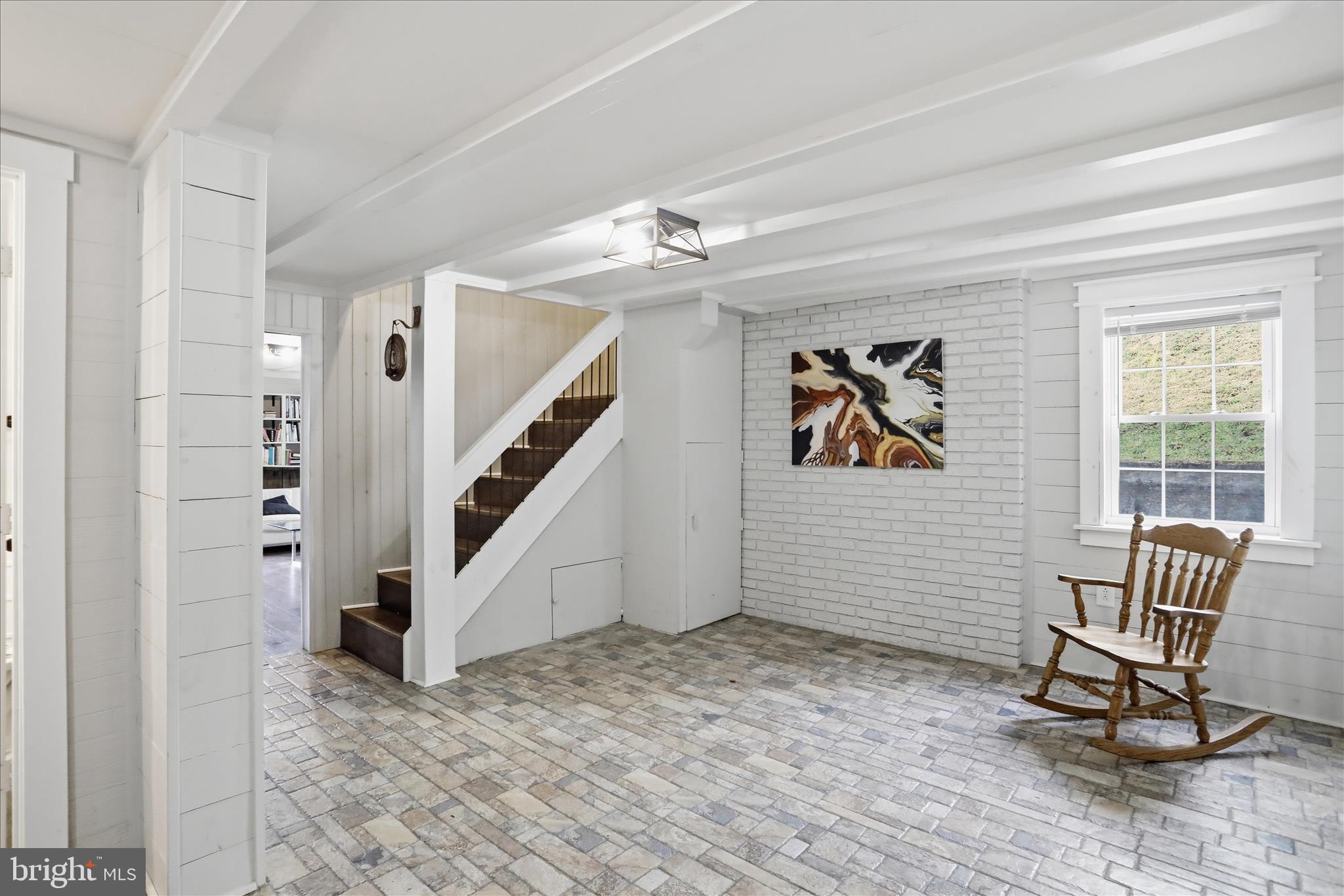 277 Bowmans Ridge Lane Burlington, WV 26710 - Photo 4 of 42 a workspace with wooden floor and windows