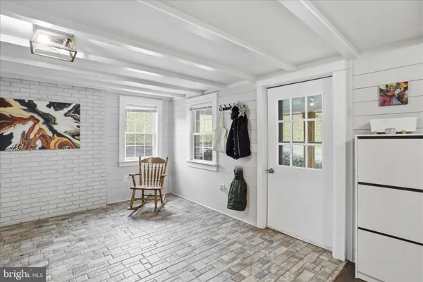 a room with furniture and a window