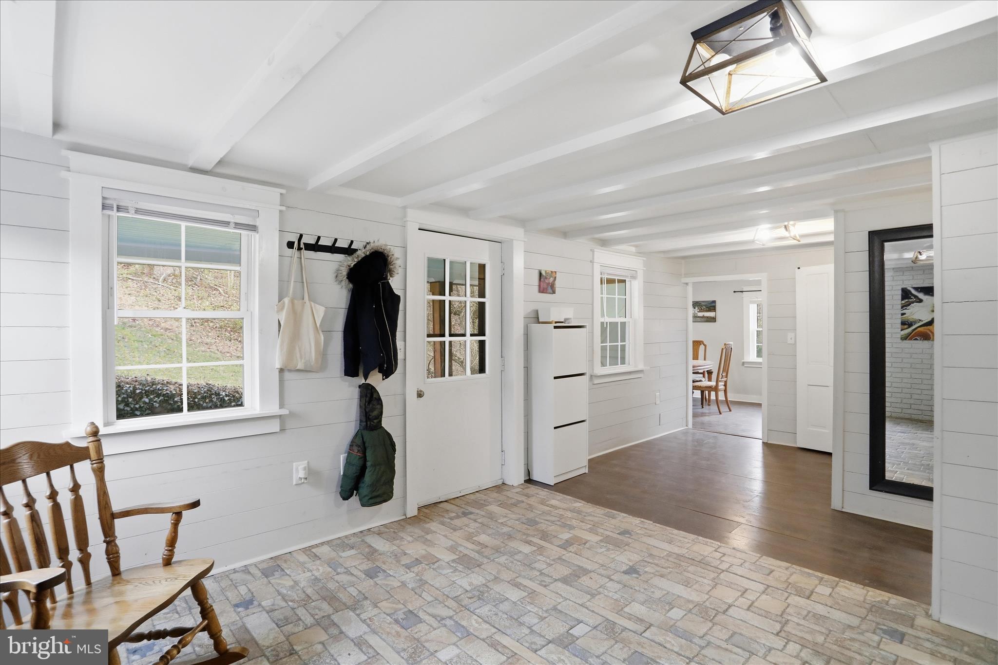 277 Bowmans Ridge Lane Burlington, WV 26710 - Photo 6 of 42 a view of a livingroom with furniture and a window