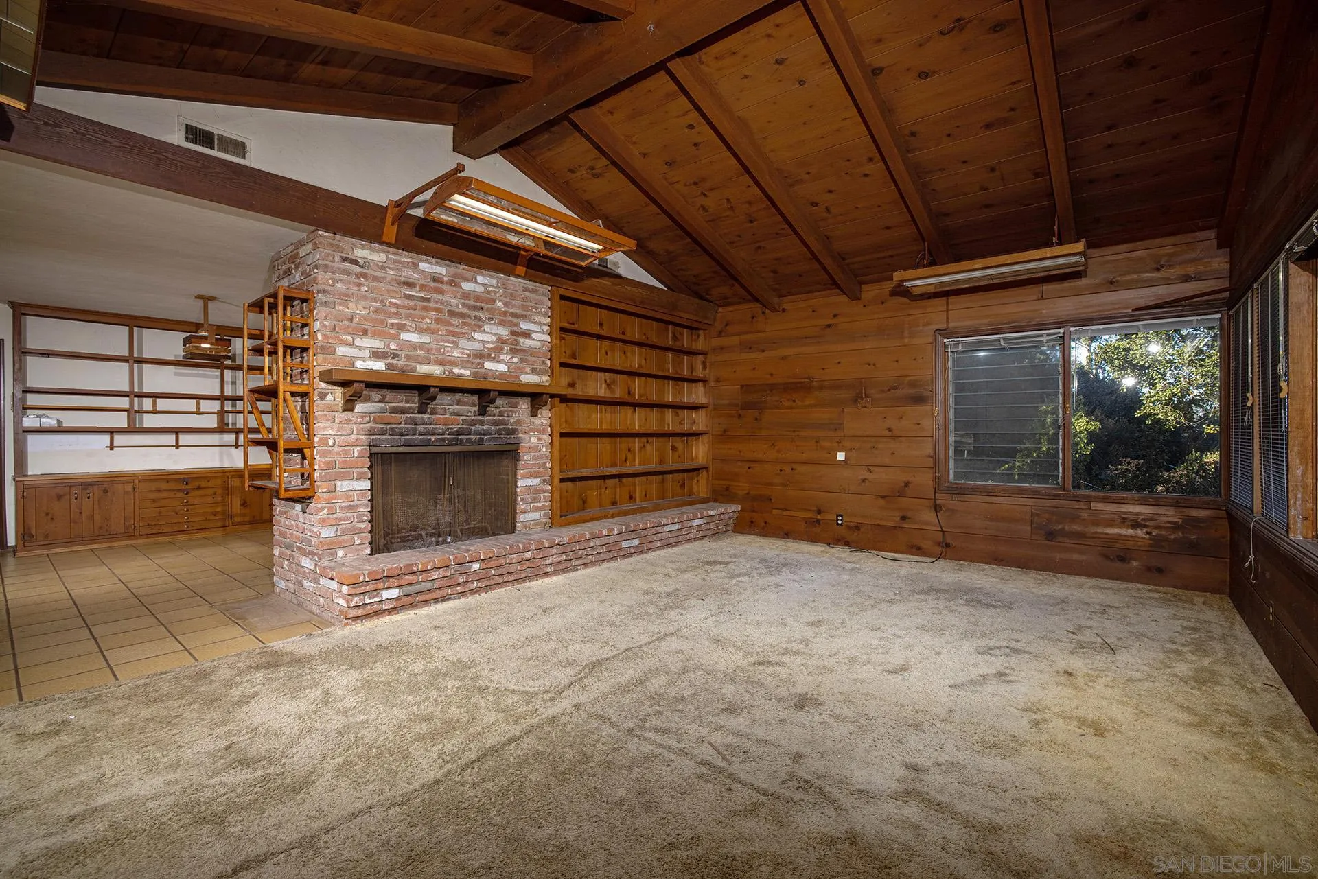 1260 Oribia Road Del Mar, CA 92014 - Photo 6 of 24 a view of empty room with wooden floor and fan