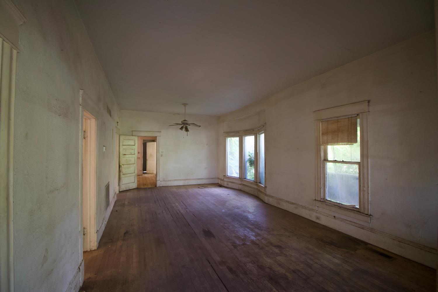 1404 Normal Avenue Chico, CA 95928 - Photo 3 of 12 a view of a livingroom with wooden floor and window