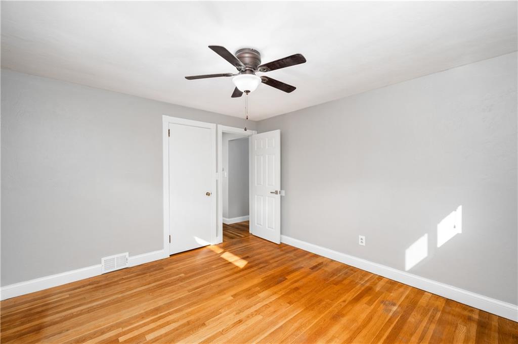350 Limerick Road Wexford, PA 15090 - Photo 18 of 47 a view of a room with wooden floor and a ceiling fan