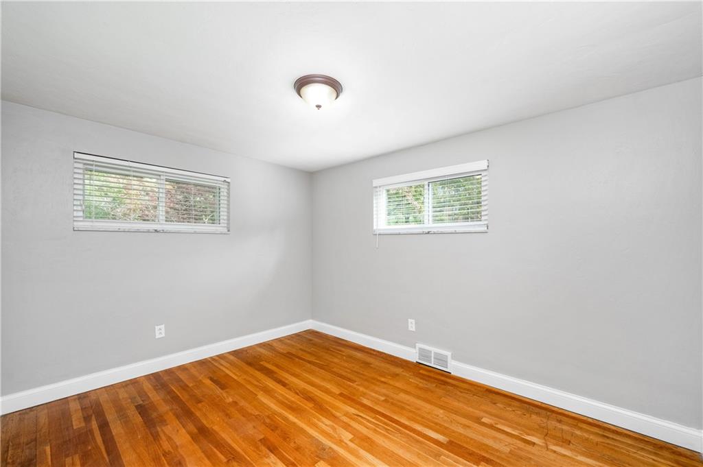 350 Limerick Road Wexford, PA 15090 - Photo 20 of 47 a view of a room with wooden floor and windows