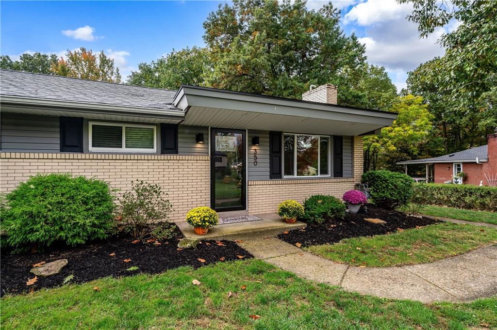 350 Limerick Road Wexford, PA 15090 - Photo 2 of 47 a front view of a house with garden