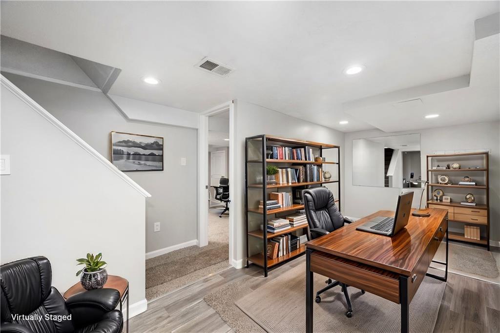 350 Limerick Road Wexford, PA 15090 - Photo 25 of 47 a living room with furniture and a book shelf
