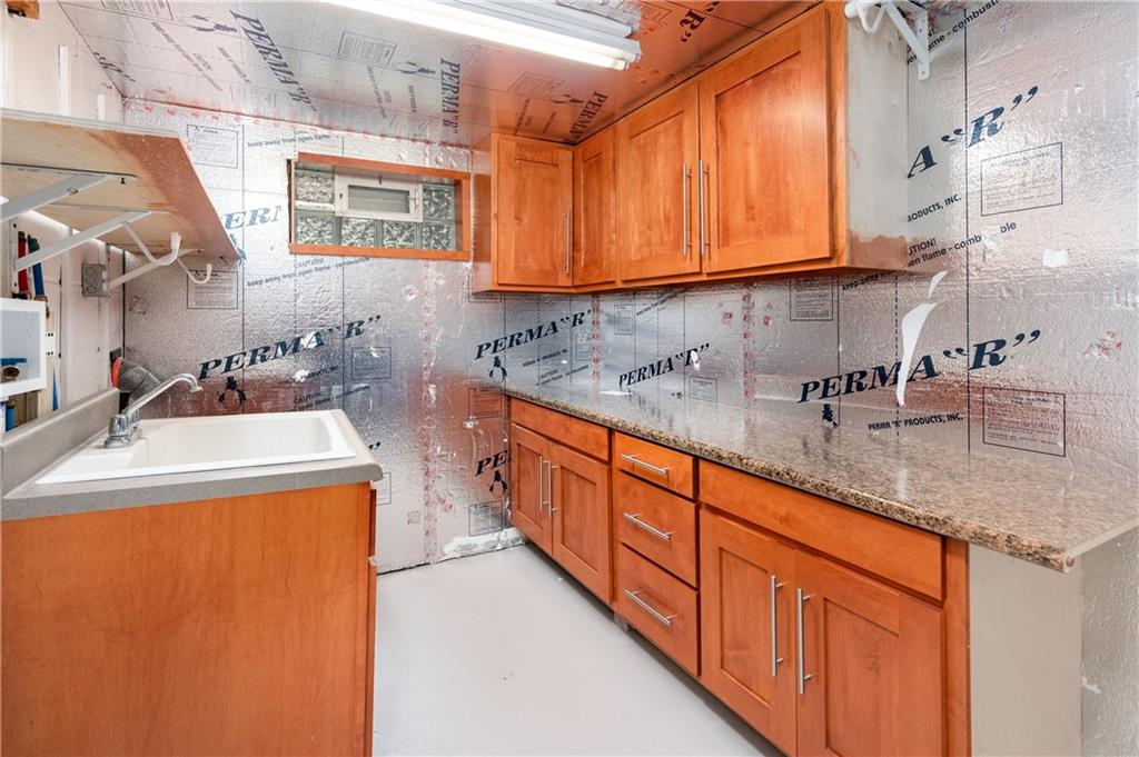 350 Limerick Road Wexford, PA 15090 - Photo 33 of 47 a kitchen with stainless steel appliances granite countertop a sink stove and cabinets
