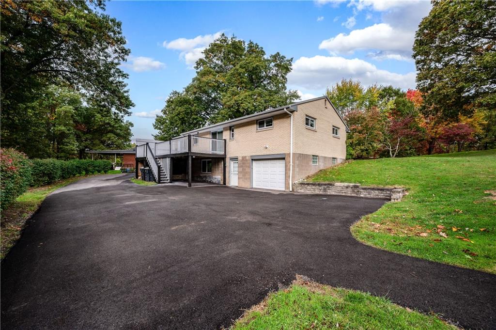 350 Limerick Road Wexford, PA 15090 - Photo 37 of 47 a view of a house with backyard and a tree