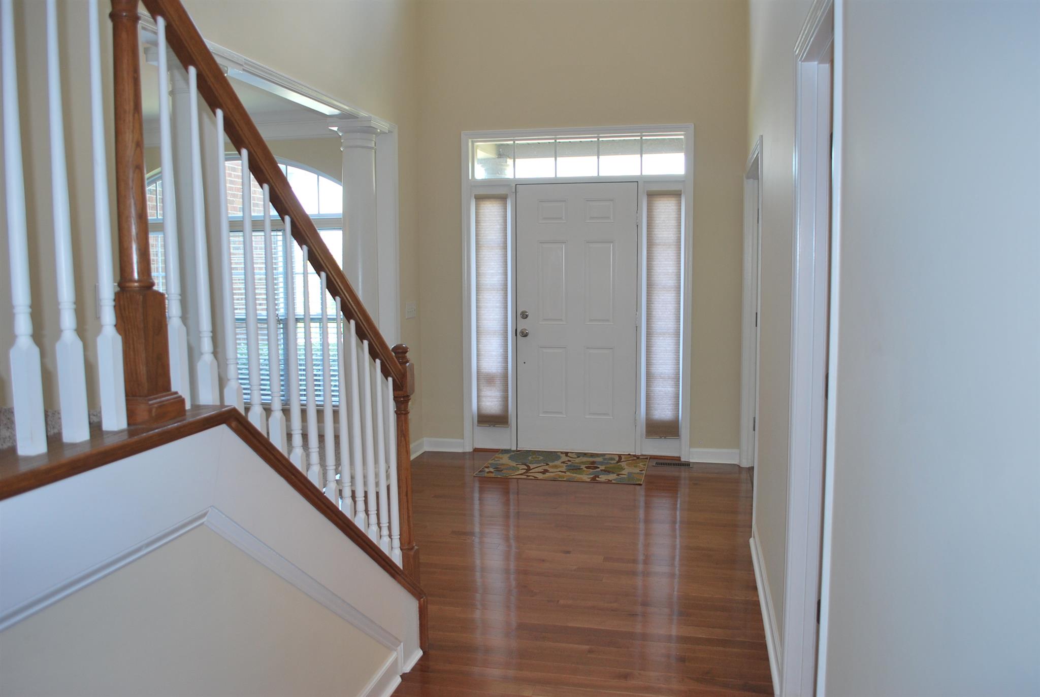 2016 Brewster Drive Franklin, TN 37067 - Photo 2 of 30 a view of a hallway with wooden floor and staircase