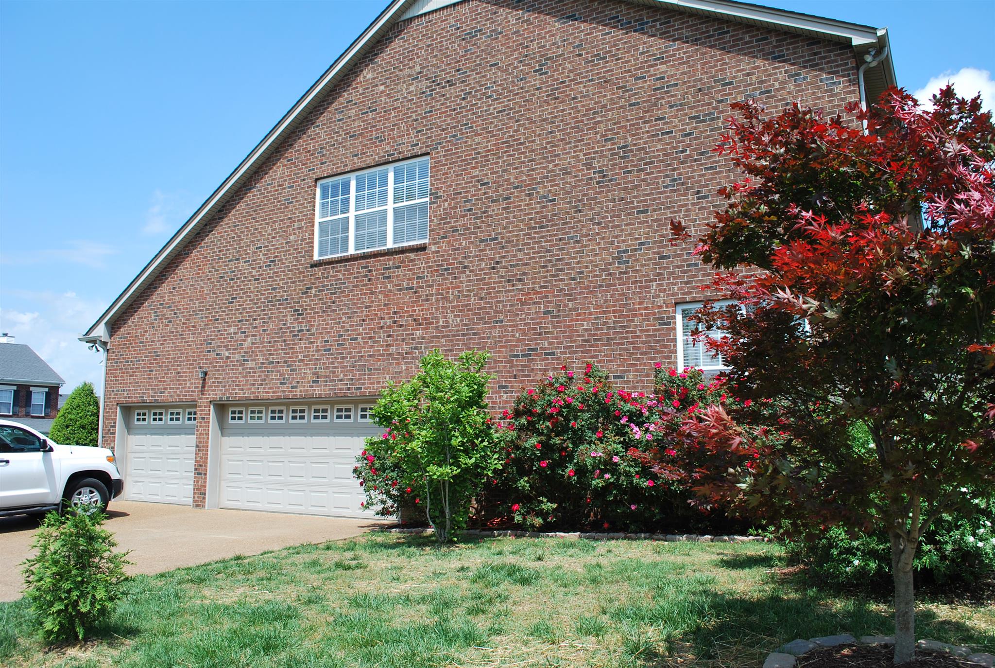 2016 Brewster Drive Franklin, TN 37067 - Photo 26 of 30 a view of a house with a yard and garden