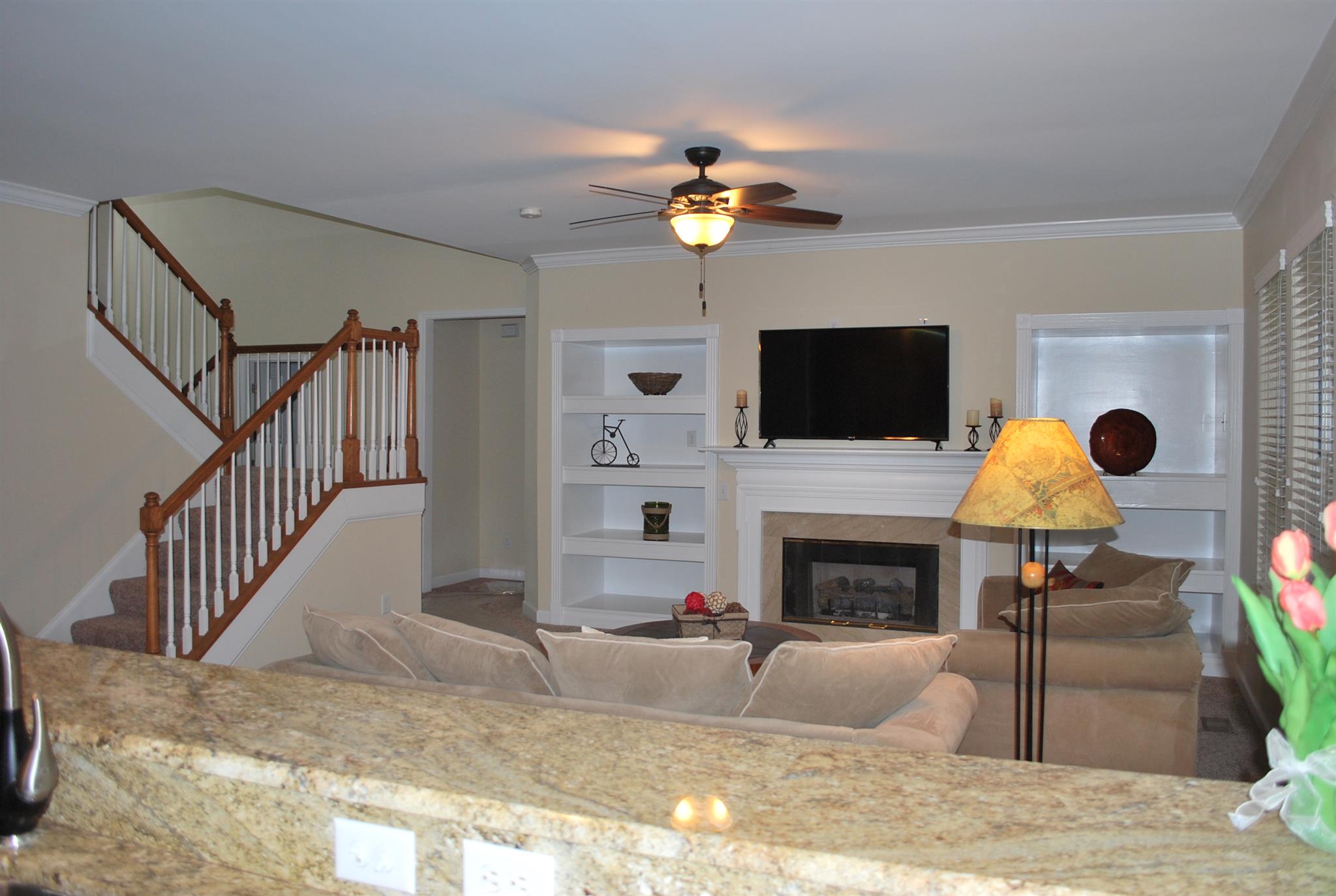 2016 Brewster Drive Franklin, TN 37067 - Photo 8 of 30 a living room with fireplace furniture and a flat screen tv