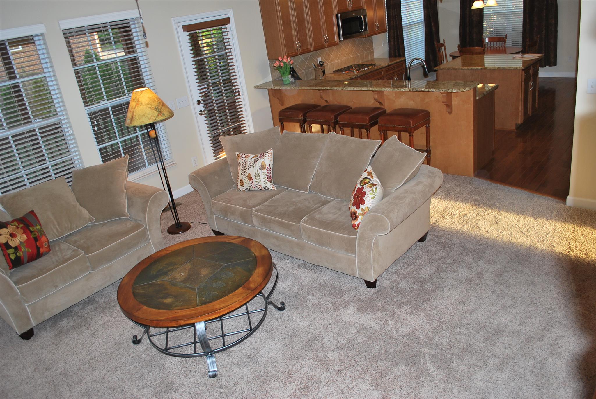 2016 Brewster Drive Franklin, TN 37067 - Photo 10 of 30 a living room with furniture and a lamp