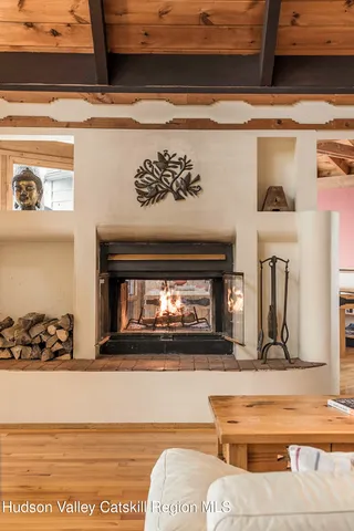 a view of fireplace and living room