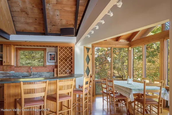 a living room with large windows