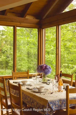 a view of a kitchen with granite countertop next to a yard