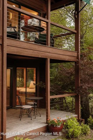 a backyard of a house with outdoor seating