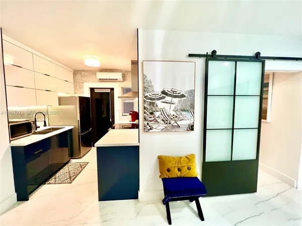 a bedroom with a bed and ceiling fan