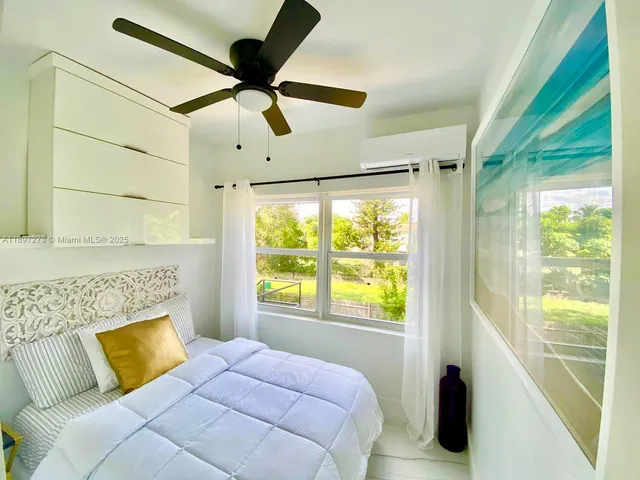 a view of a backyard with sitting area