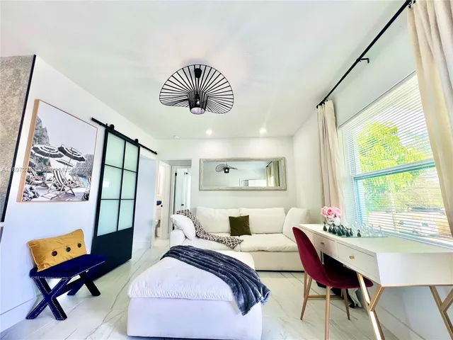 a view of a bench in the backyard