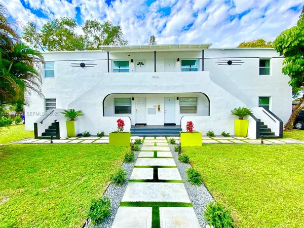 a front view of house with yard