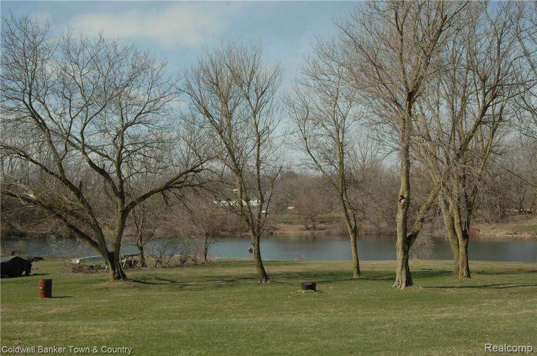 9093 Antcliff Road Howell, MI 48855 - Photo 20 of 30 Private pond. Perfect for canoeing, paddle boat, fishing.