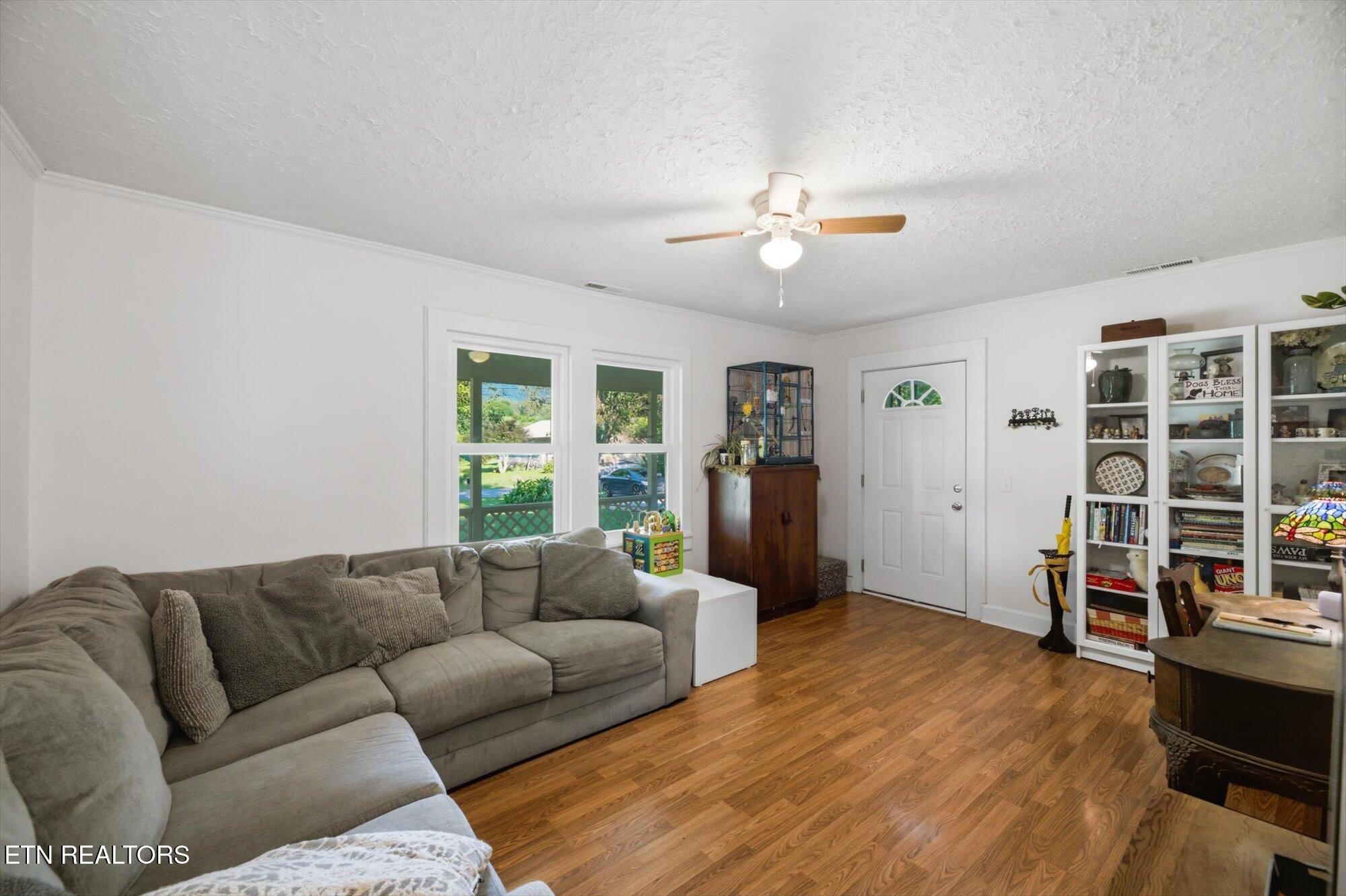 159 Mill Street Delano, TN 37325 - Photo 7 of 22 a living room with furniture and a window