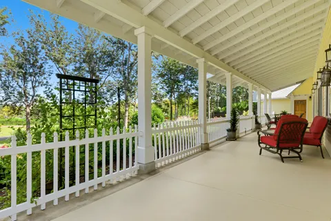 a view of dirt and trees