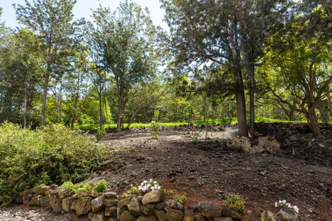a view of a swimming pool with an outdoor seating