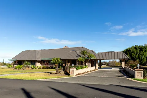 a view of a garden with swings