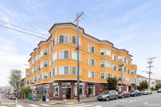 a front view of a building and a street