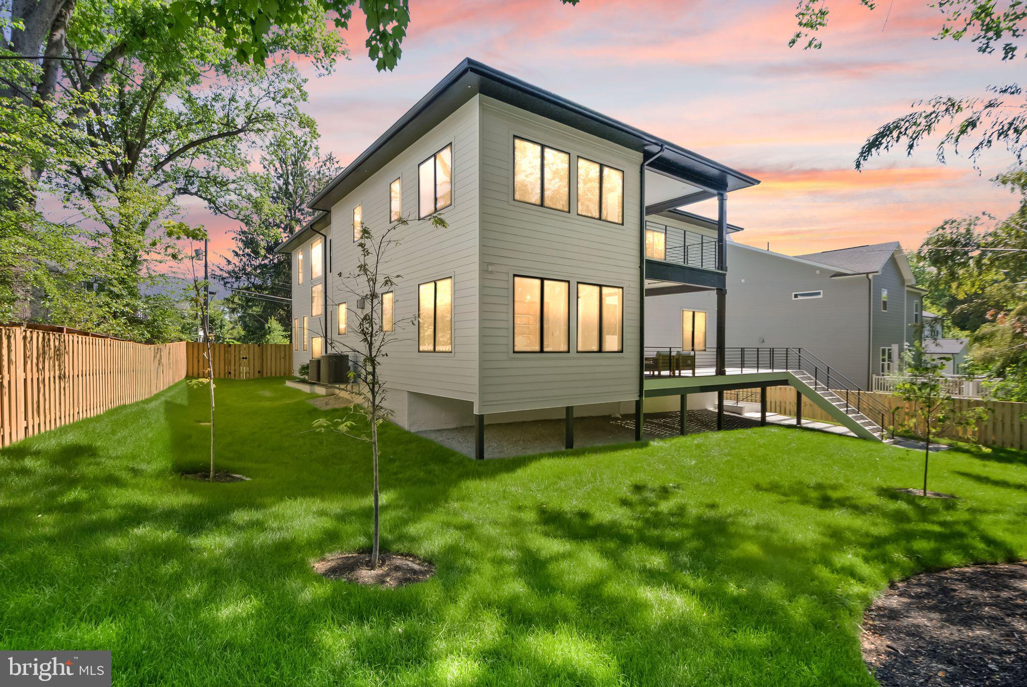 6329 Halsey Road McLean, VA 22101 - Photo 3 of 94 Modern home with lush green yard.