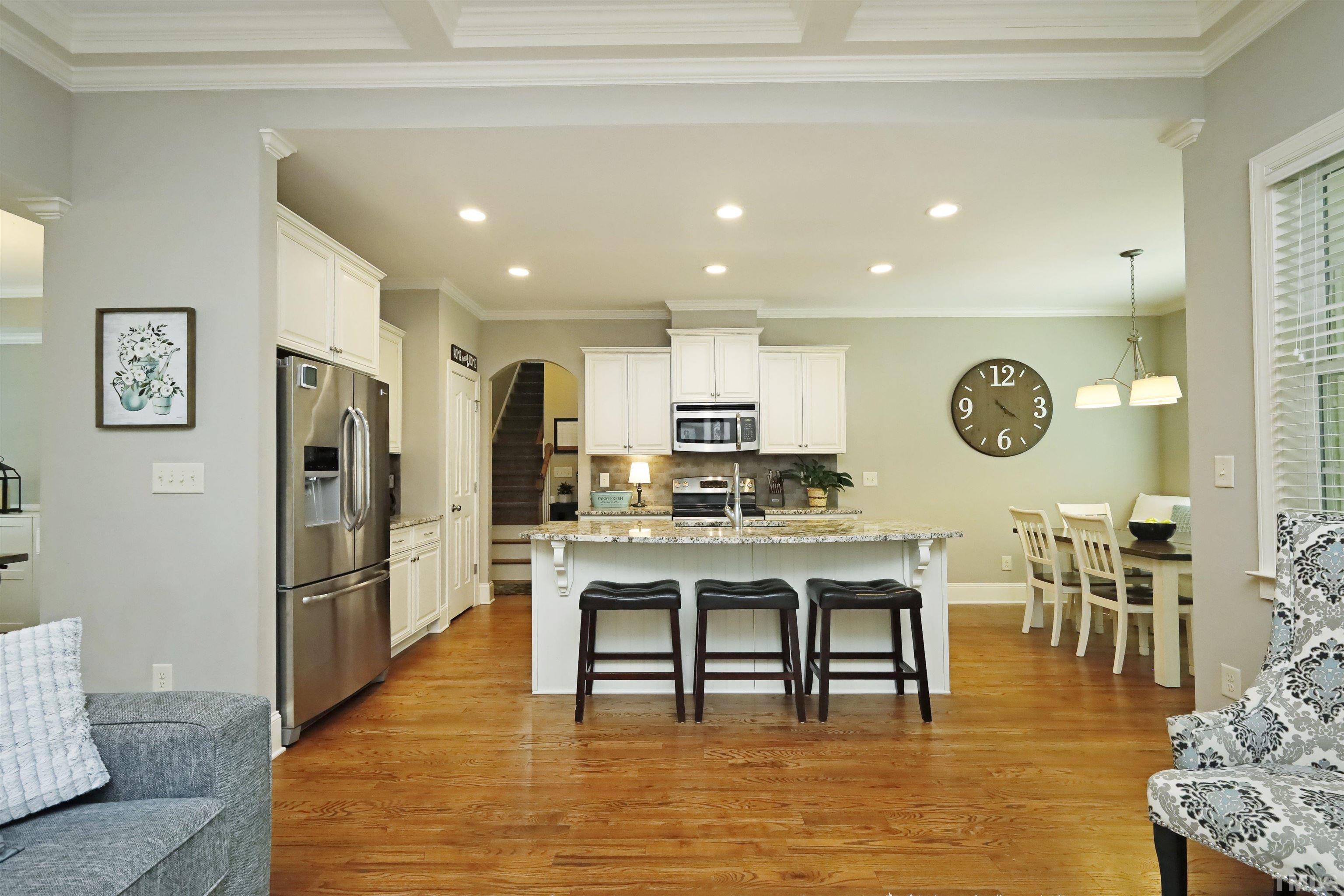 3630 Pine Needles Drive Wake Forest, NC 27587 - Photo 14 of 47 a view of a kitchen with dining table and chairs