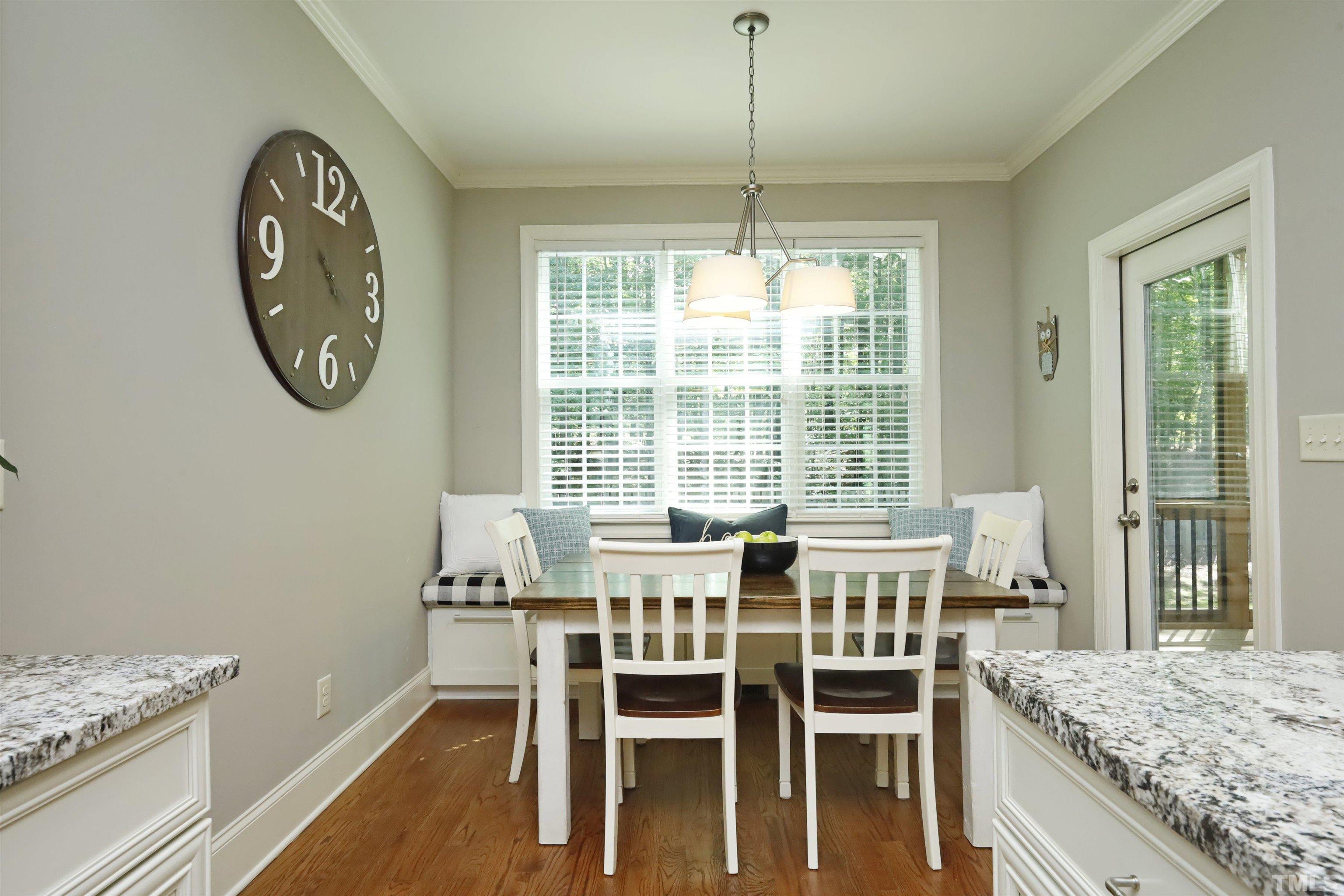 3630 Pine Needles Drive Wake Forest, NC 27587 - Photo 20 of 47 a view of a dining room with furniture window and outside view