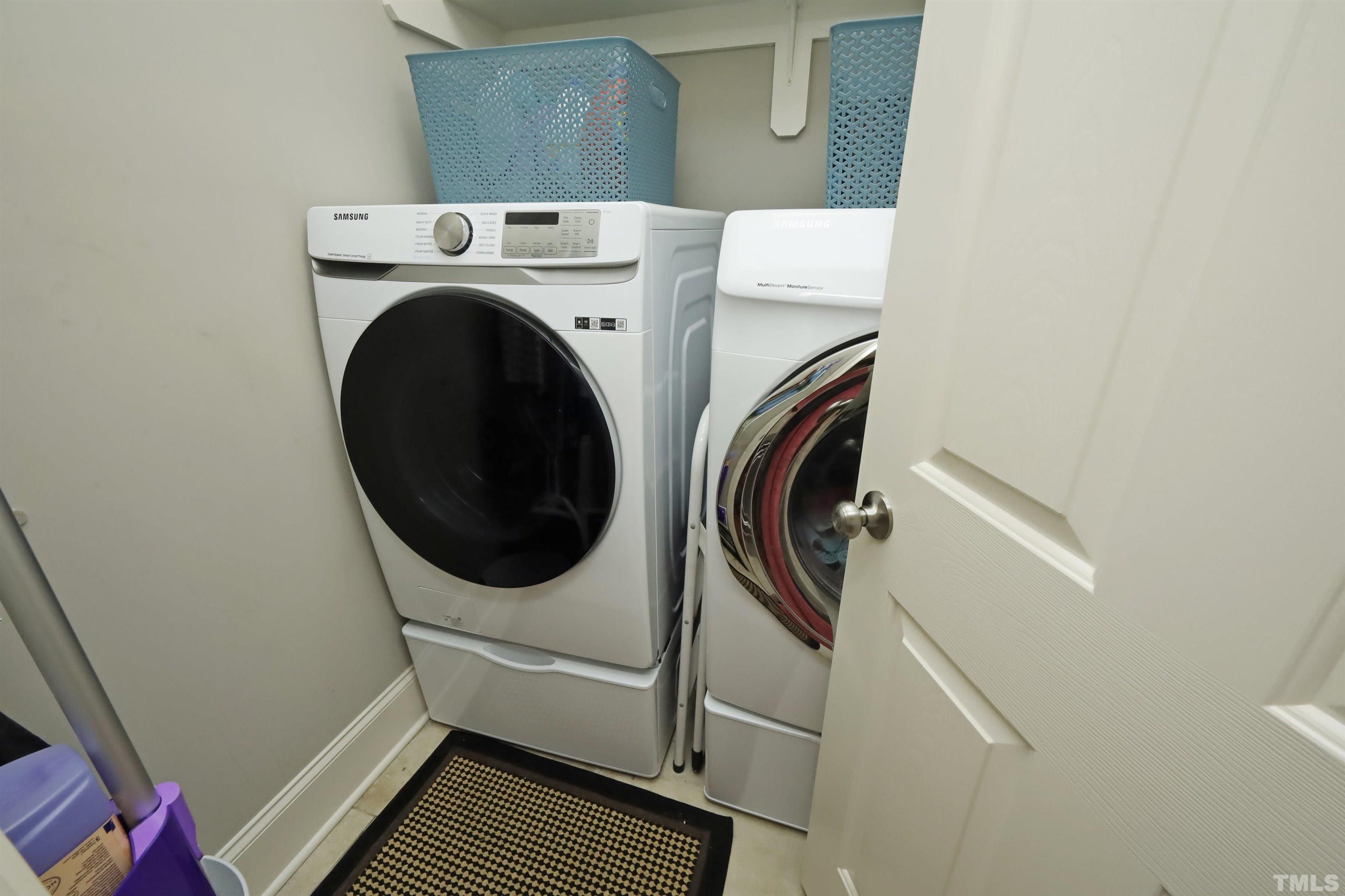 3630 Pine Needles Drive Wake Forest, NC 27587 - Photo 23 of 47 a utility room with dryer and washer