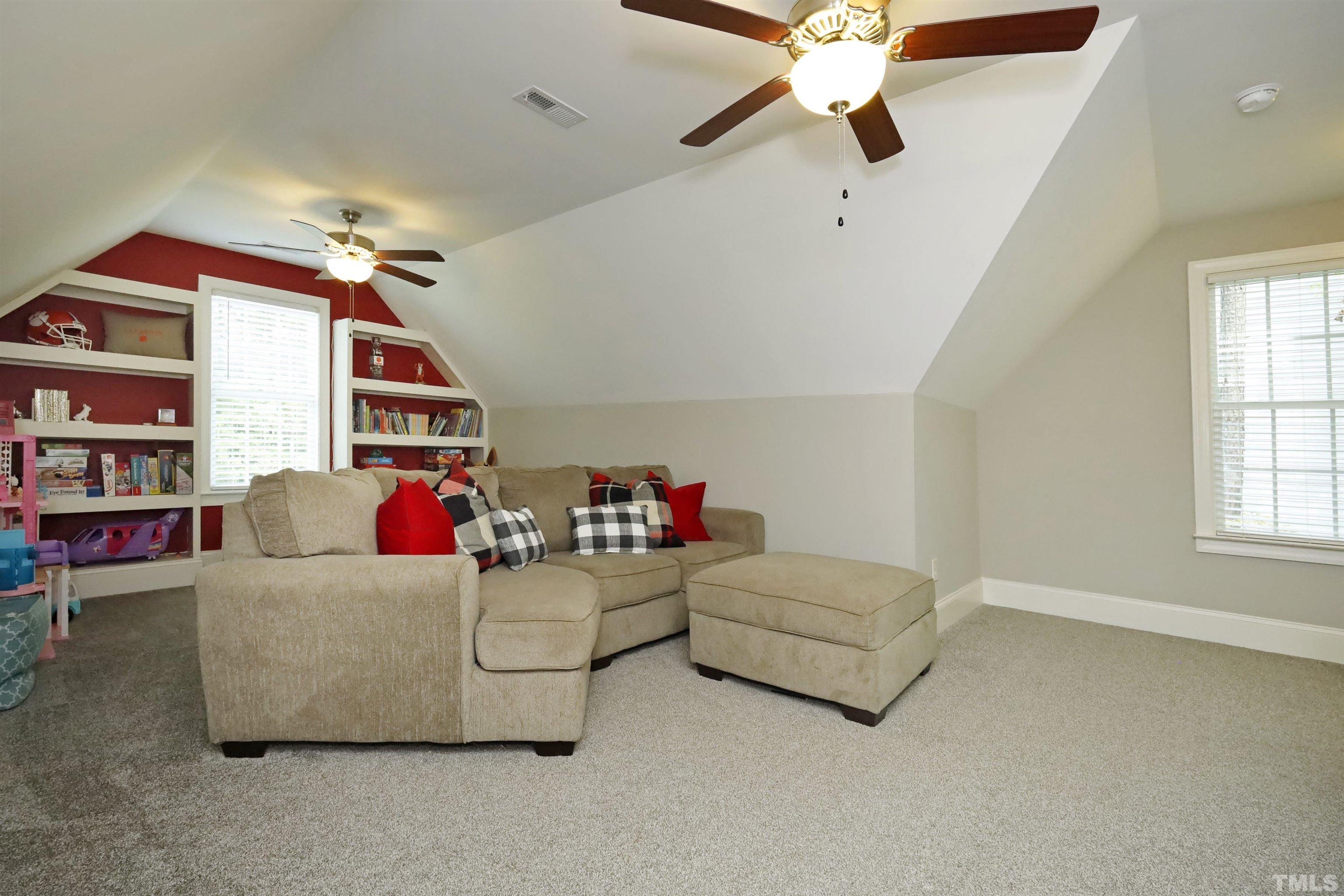 3630 Pine Needles Drive Wake Forest, NC 27587 - Photo 29 of 47 a living room with furniture and a window