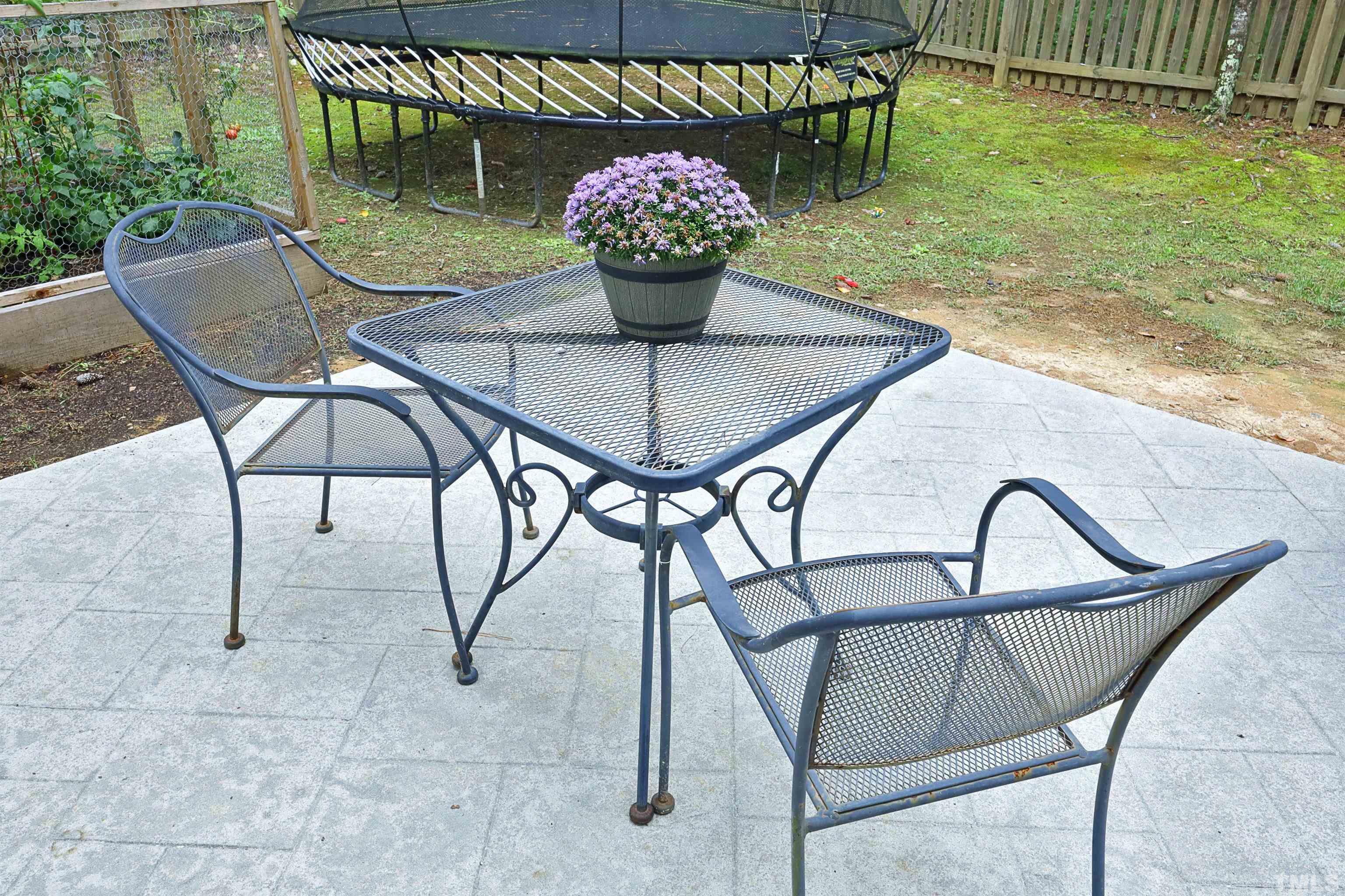 3630 Pine Needles Drive Wake Forest, NC 27587 - Photo 40 of 47 a view of a chairs and tables in the patio