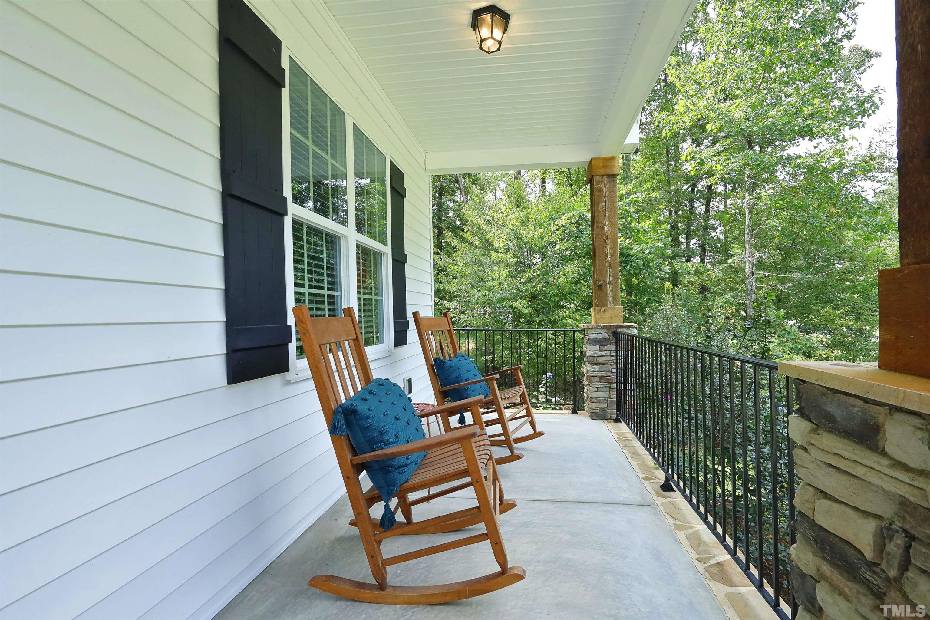 3630 Pine Needles Drive Wake Forest, NC 27587 - Photo 5 of 47 a view of two chairs in balcony