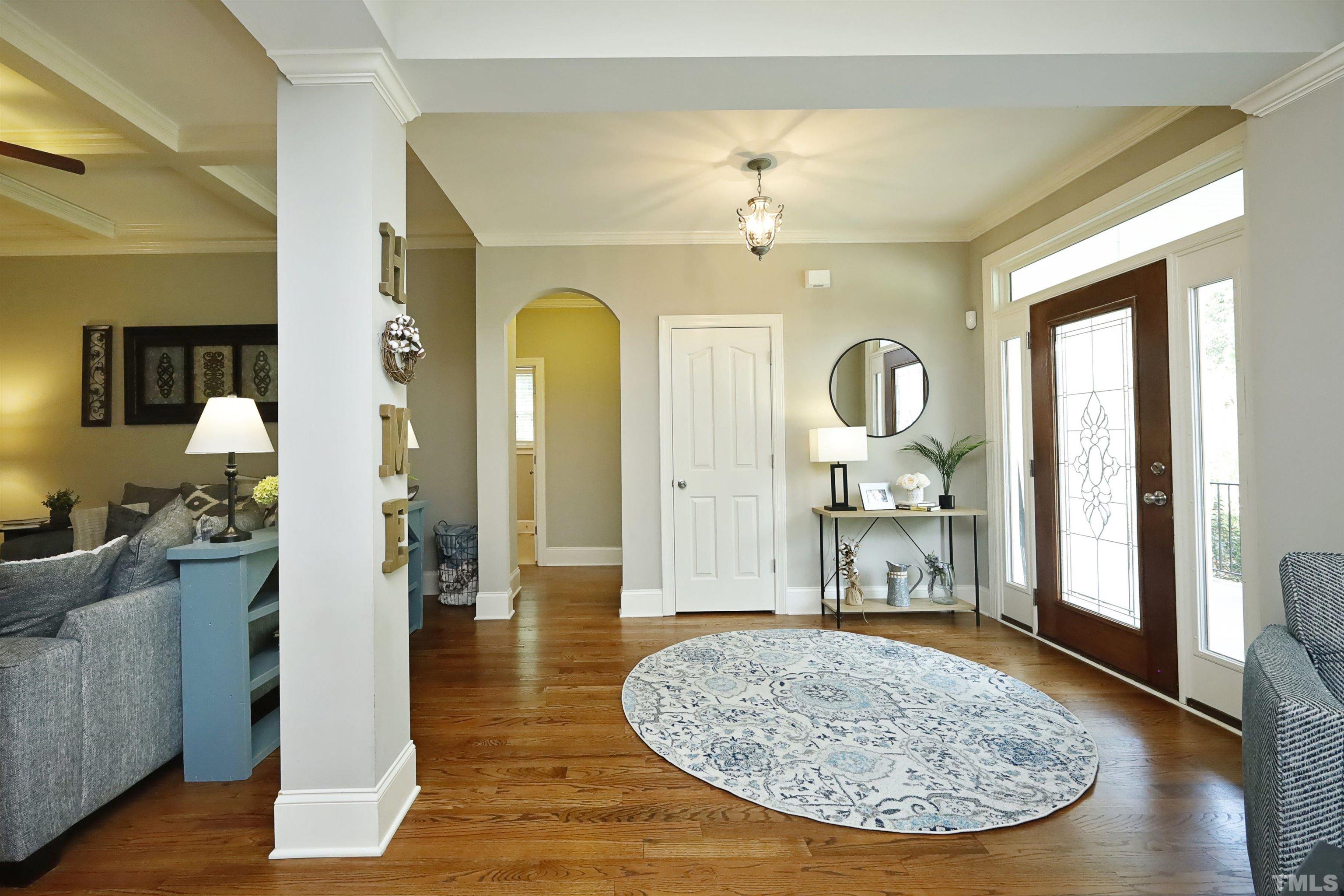 3630 Pine Needles Drive Wake Forest, NC 27587 - Photo 8 of 47 a view of a livingroom with furniture and wooden floor