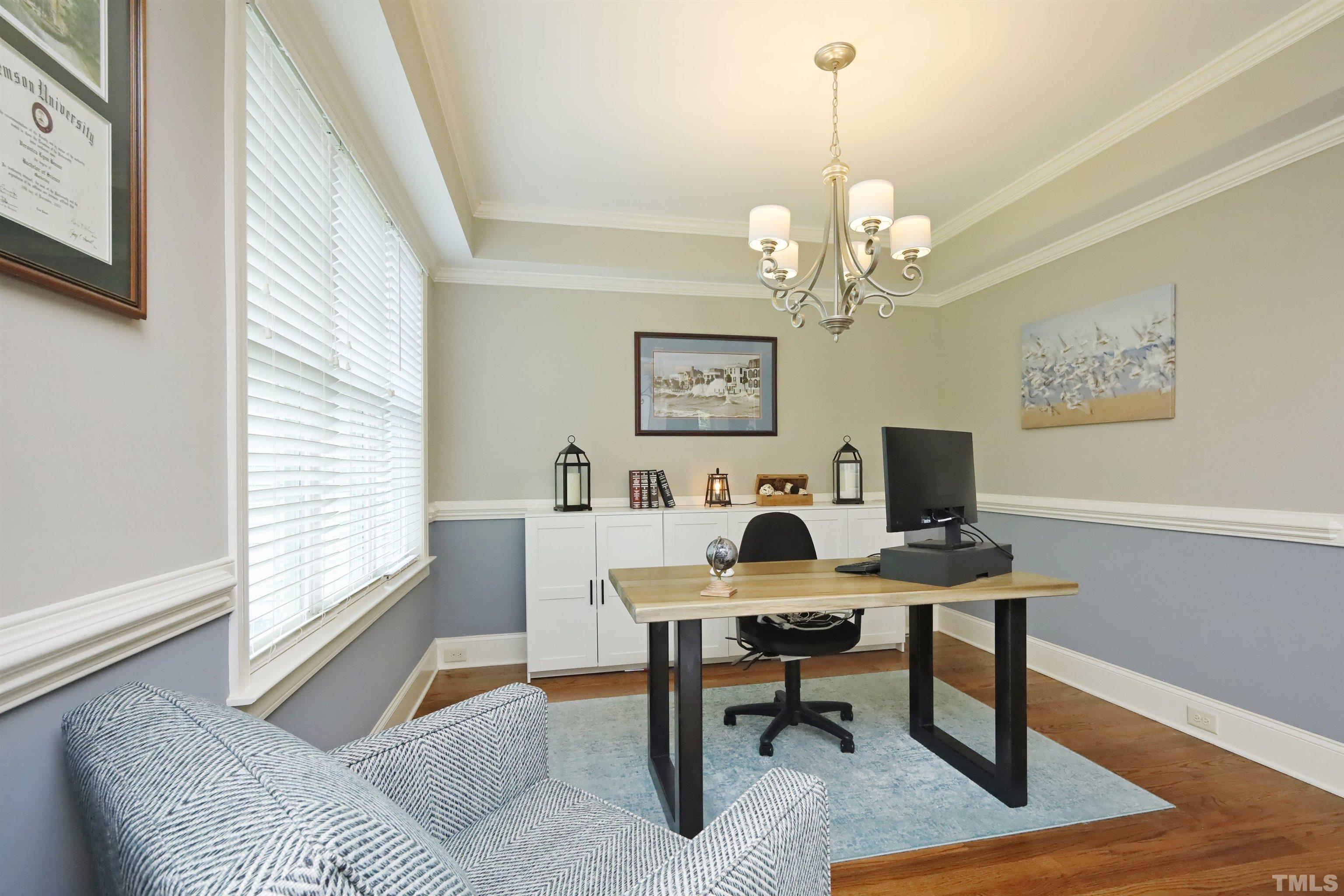 3630 Pine Needles Drive Wake Forest, NC 27587 - Photo 9 of 47 a workspace with wooden floor and a workspace