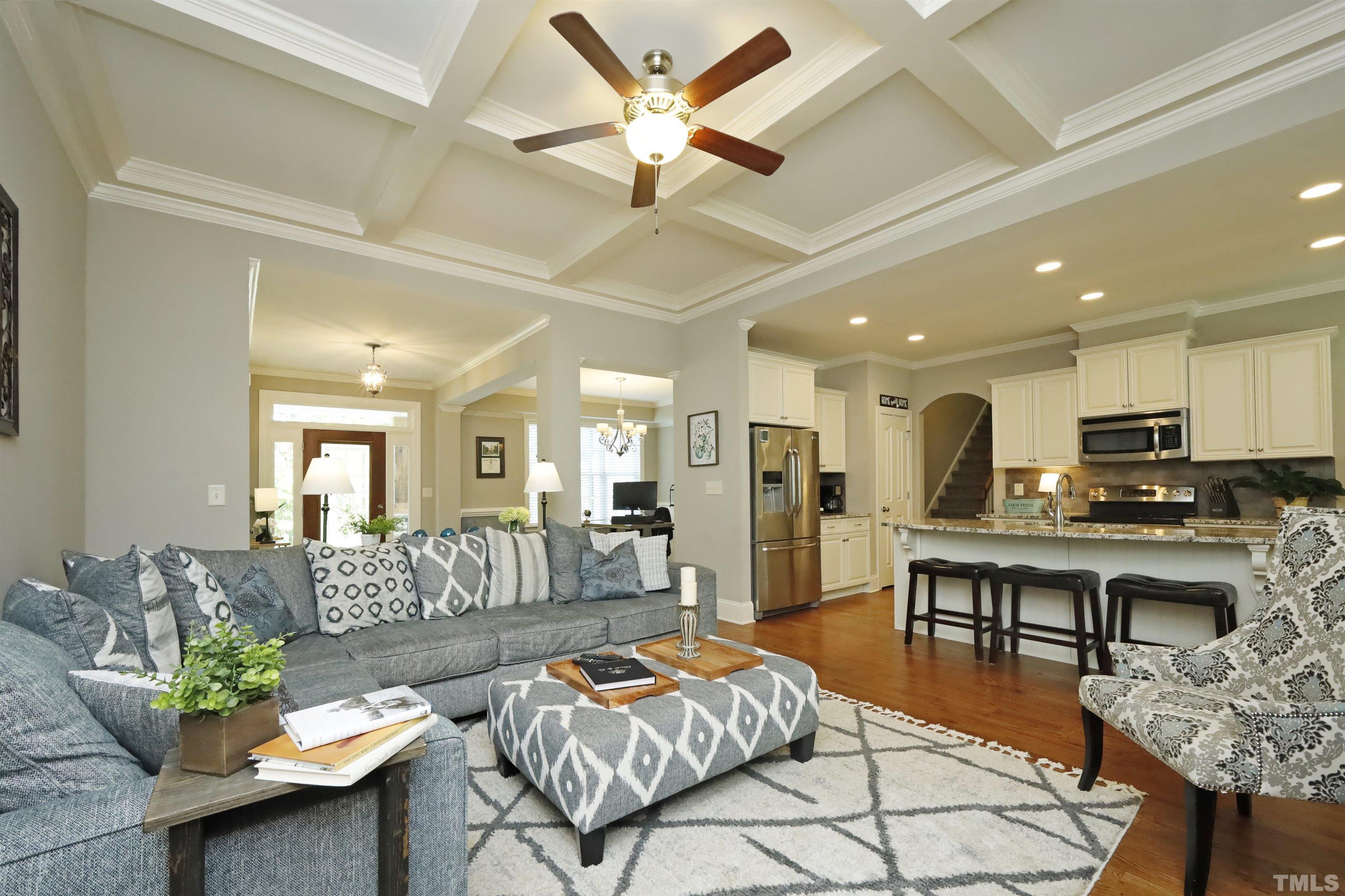 3630 Pine Needles Drive Wake Forest, NC 27587 - Photo 10 of 47 a living room with furniture kitchen view and a table